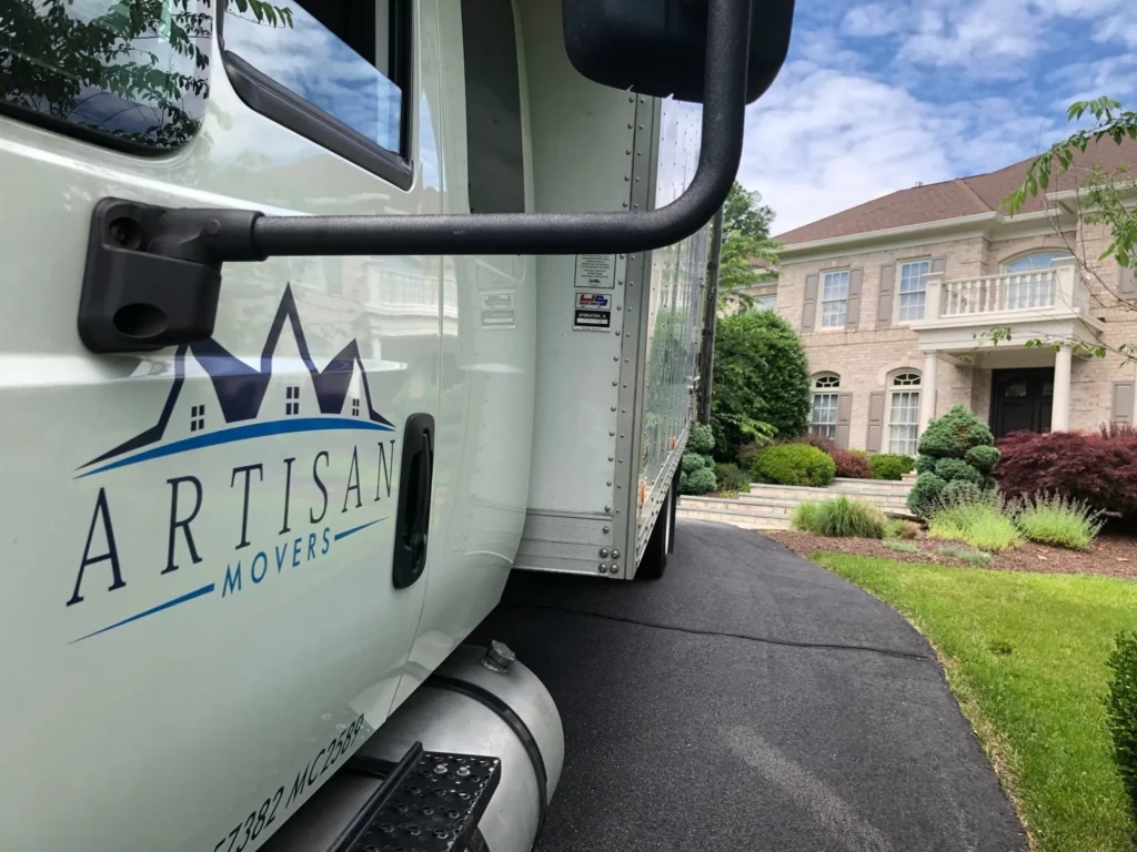 side view of artisan movers trucks
